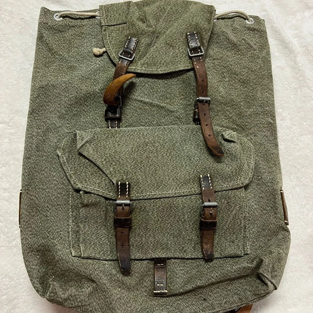 Swiss army inspired back pack leather accents